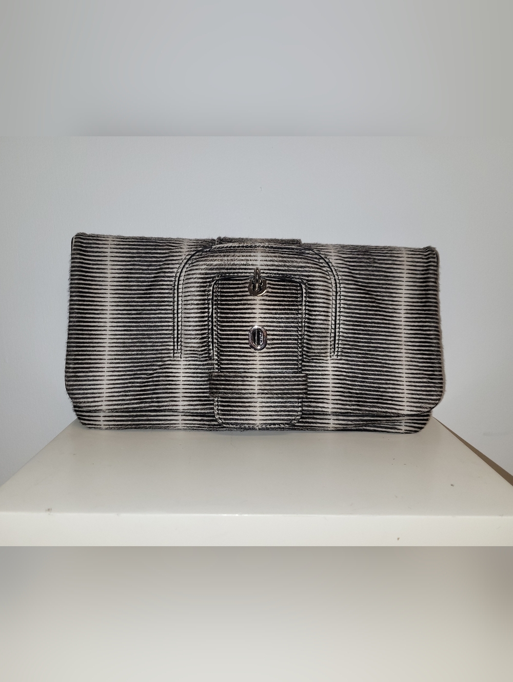 Tod's Black and White Striped Pony Style Calfskin Buckle Clutch